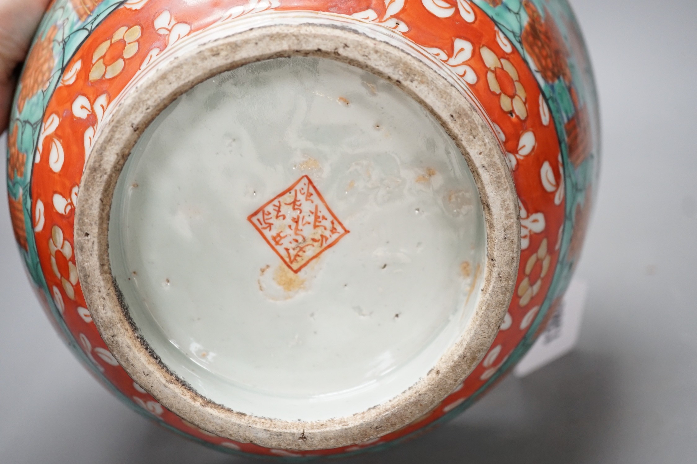 An 18th century clobbered Chinese or Japanese porcelain bowl, 24.5cm diameter